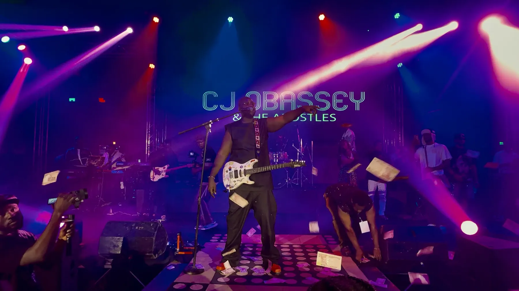 CJ Obassey and The Apostles on stage